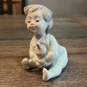 Vintage 1980’s Lladro NAO Spain Porcelain Baby With Bottle Retired in 2001
